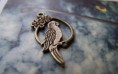 REF. CM00107 COLGANTE LORO BRONCE MEDIDA 15 x 28 MM 0,30 EUROS / Unidad
